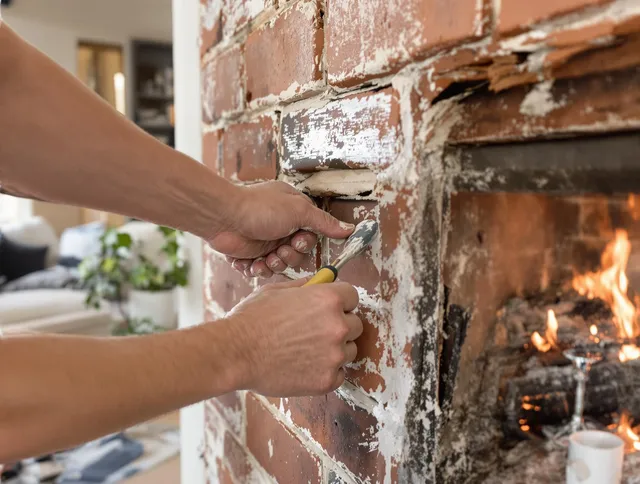 Routine fireplace repair by Westerville Chimney Sweep in Westerville, OH
